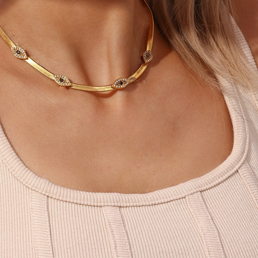 Exquisite 18k Gold Herringbone Necklace with Evil Eye Charms and Diamond Simulants 2