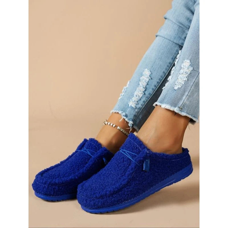 Women's Plush Moccasin Slippers in Blue – product view | Hensley London