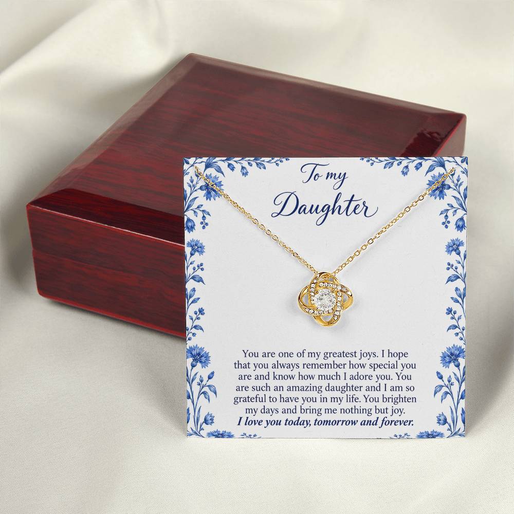 Love Knot necklace with Blue Porcelain daughter message card – yellow gold finish necklace and card beside Luxury Box | Hensley London