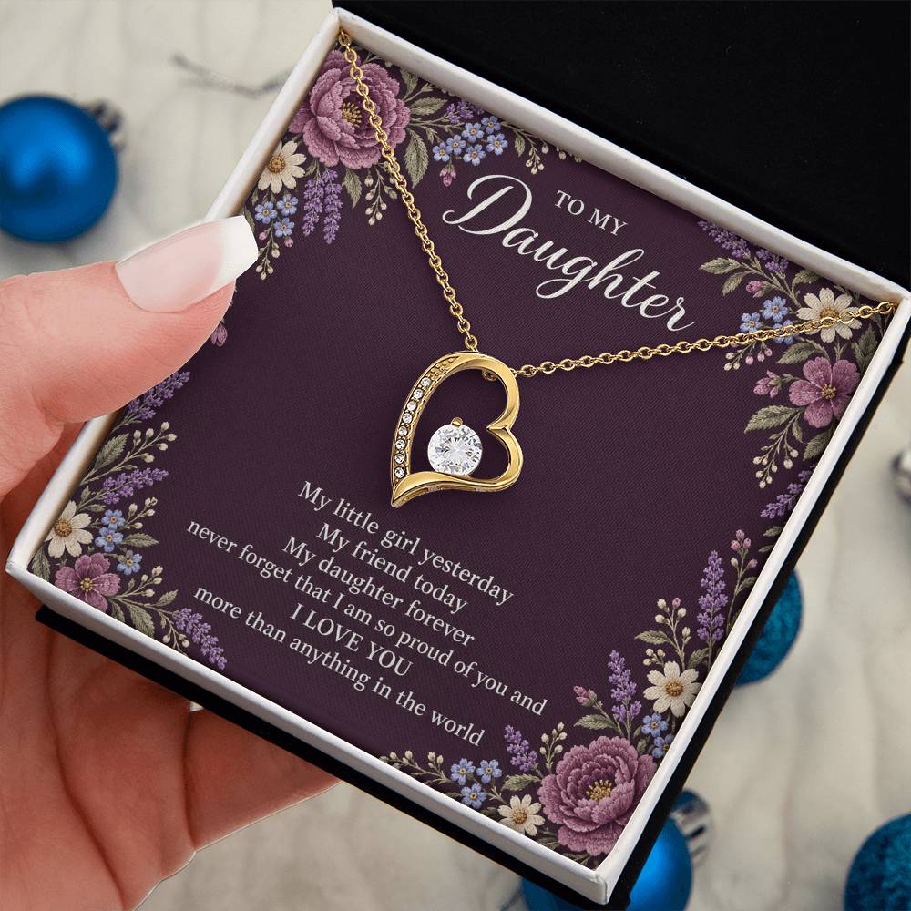 Gift for Daughter Forever Love necklace with Plum Embroidered Meadow message card in Yellow Gold Finish – standard box held in hand | Hensley London