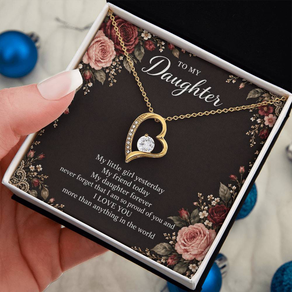 Gift for Daughter Forever Love necklace with Midnight Rose Lace message card in Yellow Gold Finish – standard box held in hand | Hensley London