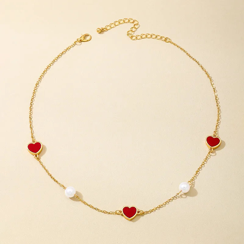 Women's Red Heart Pearl Station Necklace - View 6 | Hensley London