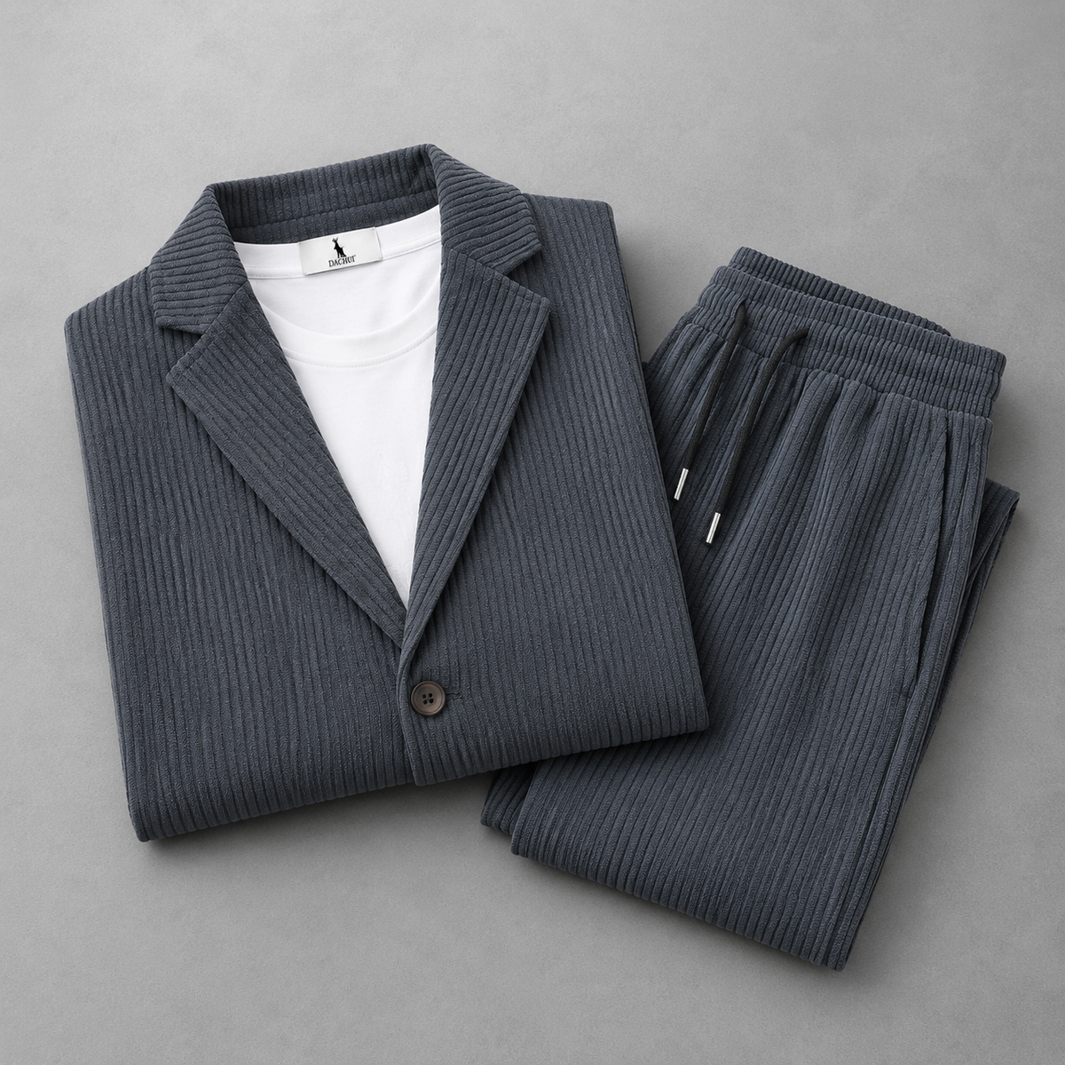Men's Corduroy Blazer and Drawstring Trouser Set in Grey – folded detail view | Hensley London