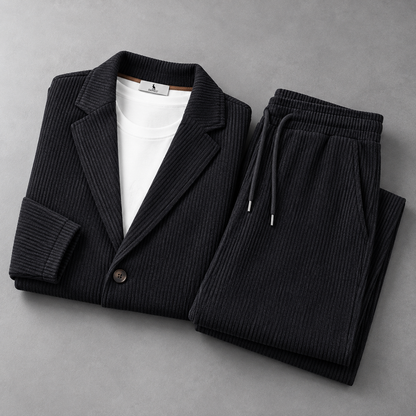 Men's Corduroy Blazer and Drawstring Trouser Set in Black – folded detail view | Hensley London