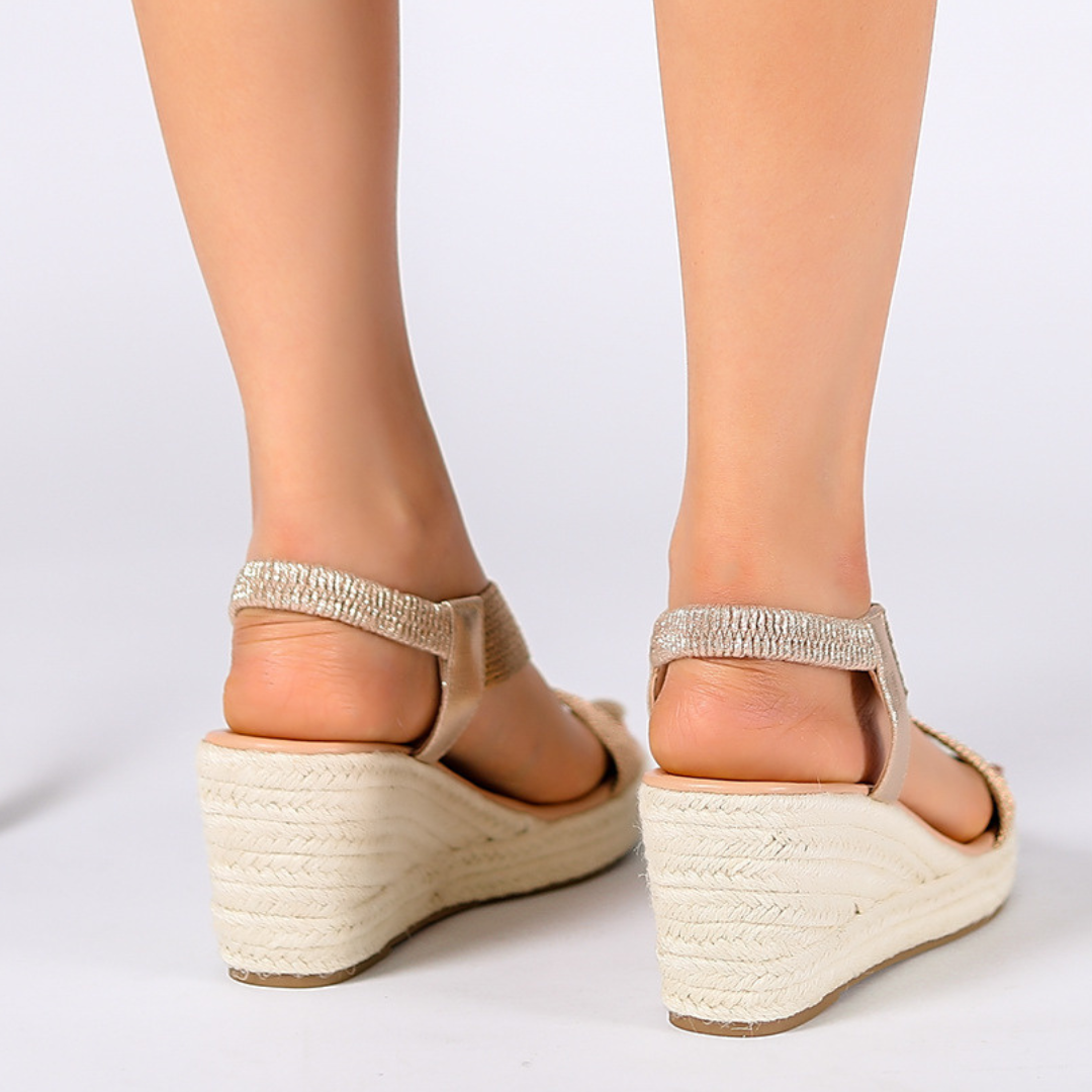 Women's Braided Strap Wedge Sandals in Gold – rear view on feet | Hensley London