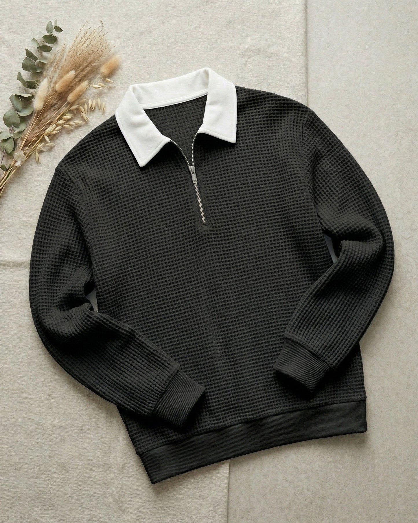 Men's Waffle Knit Zip Polo in Black – front view | Hensley London