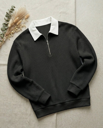 Men's Waffle Knit Zip Polo in Black – front view | Hensley London