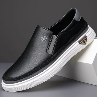 Men's Leather Slip-On Sneakers in Black – front view | Hensley London