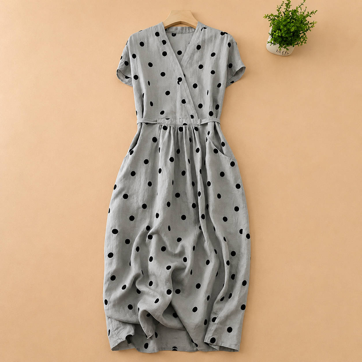 Women's Polka Dot Wrap Midi Dress in Polka Dot Print – close-up view | Hensley London