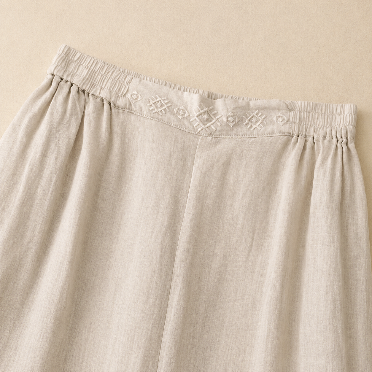 Women's Cotton Linen Wide Leg Embroidered Waist Pants – embroidered waist detail view | Hensley London