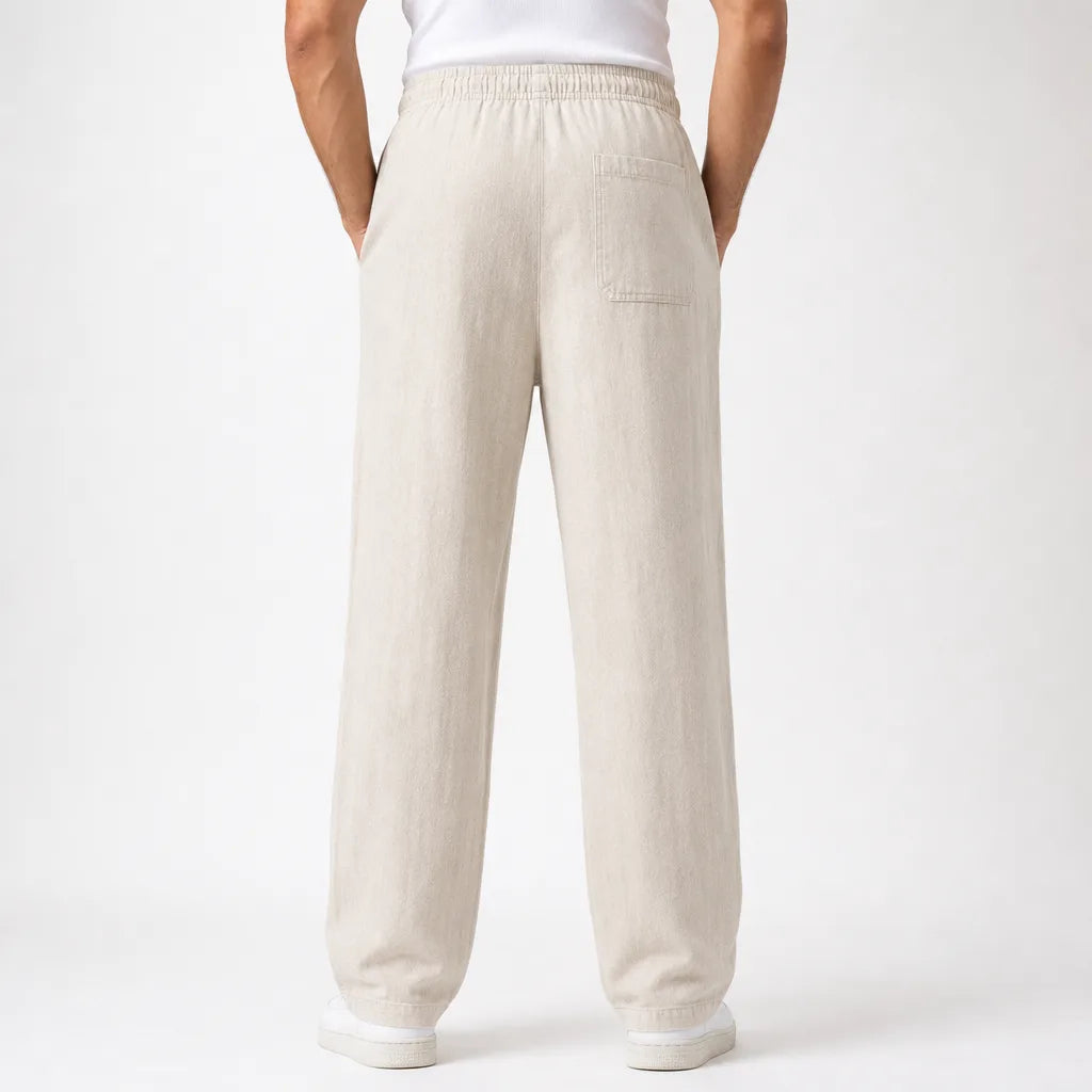 Men's Wide-Leg Drawstring Pants in Beige – detail view | Hensley London