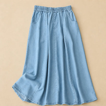 Women's Elastic-Waist Flowy Denim Skirt in Light Blue – product view | Hensley London