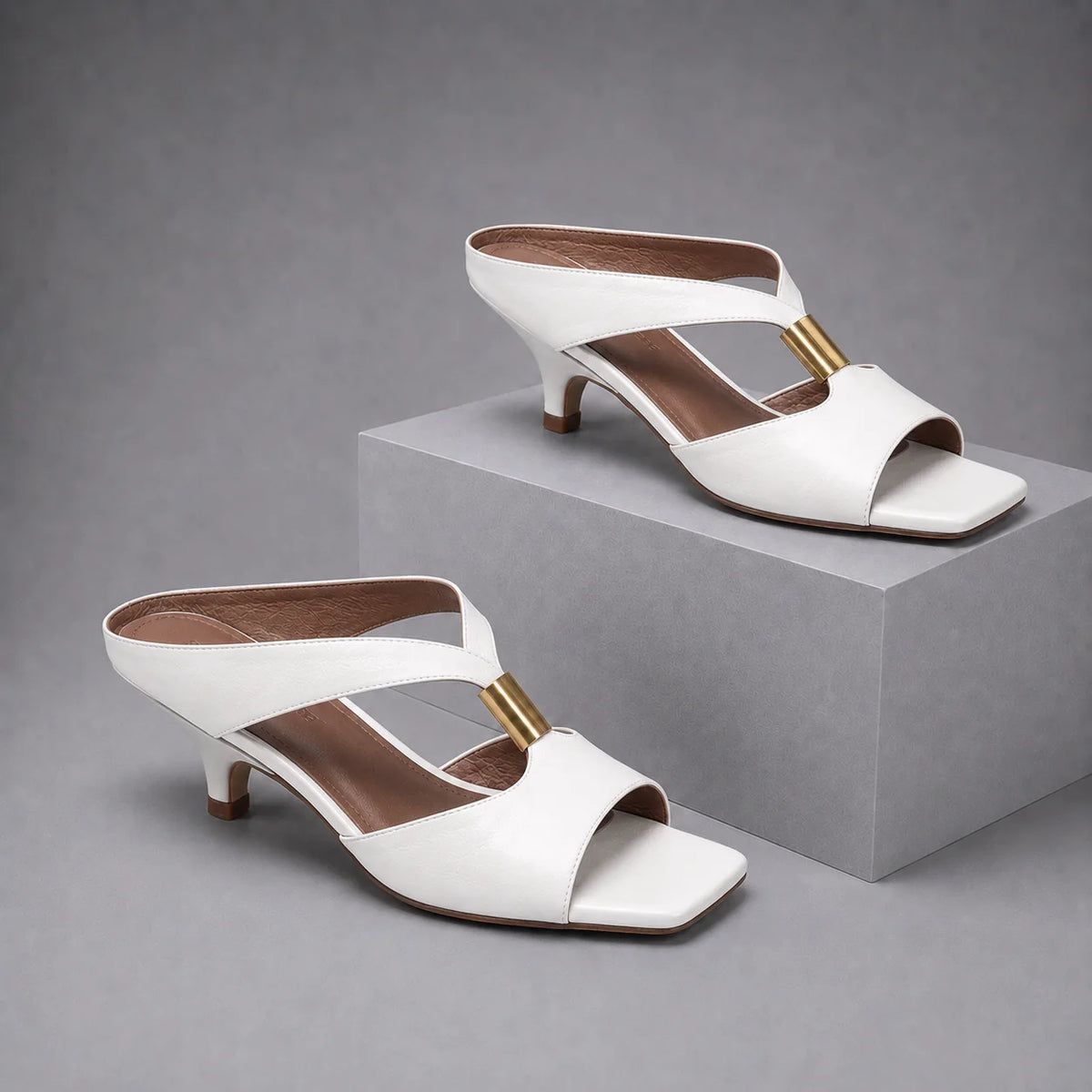 Women's T-Strap Kitten-Heel Mules in Pearl – product view | Hensley London
