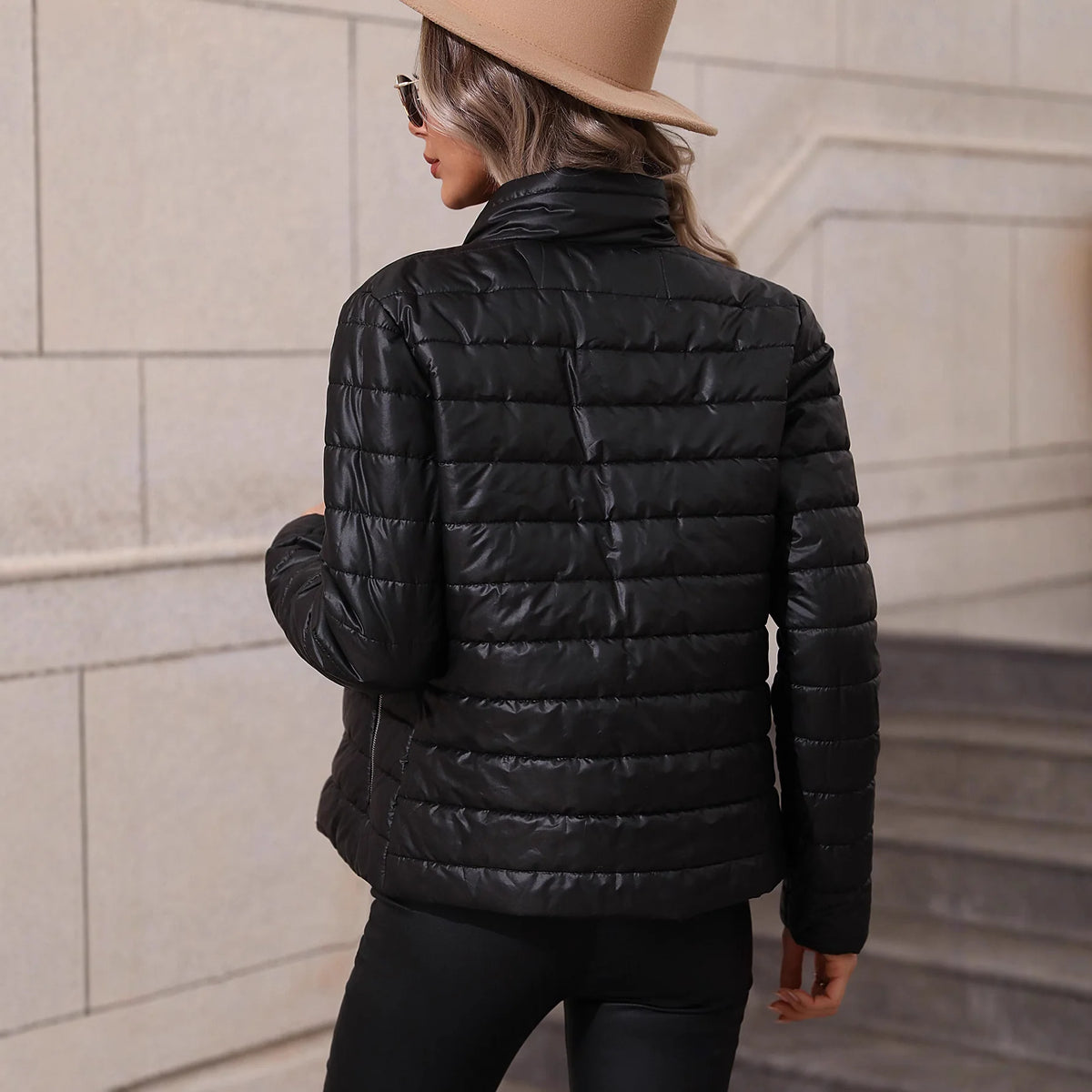 Women's Quilted Stand-Collar Zip Jacket in Black – Product view | Hensley London