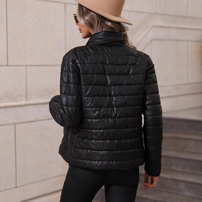 Women's Quilted Stand-Collar Zip Jacket in Black – Product view | Hensley London