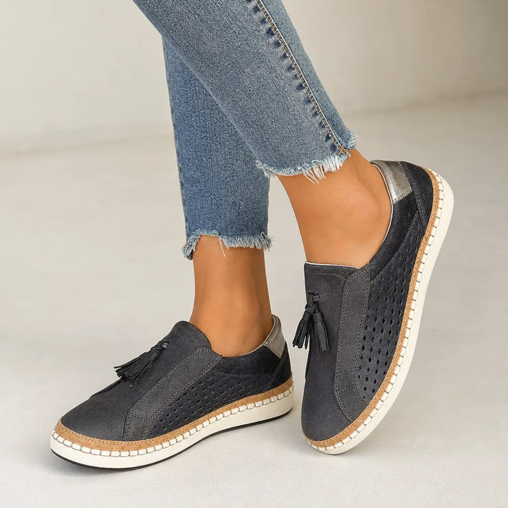 Women's Tassel Slip-On Loafers in Black – front view | Hensley London