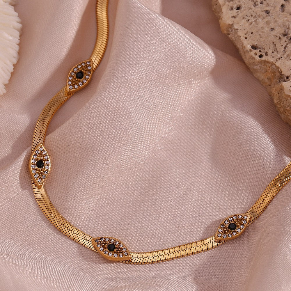 Exquisite 18k Gold Herringbone Necklace with Evil Eye Charms and Diamond Simulants 4