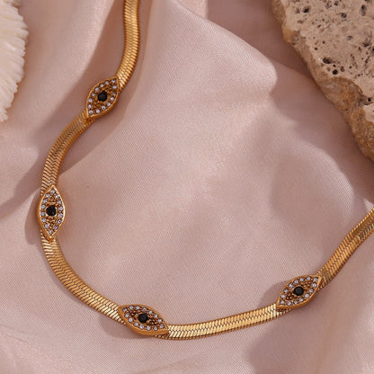 Exquisite 18k Gold Herringbone Necklace with Evil Eye Charms and Diamond Simulants 4