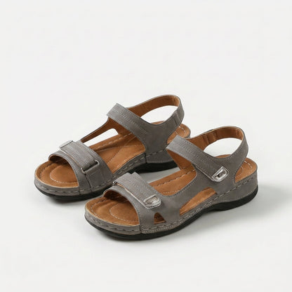 Women's Adjustable Strap Comfort Sandals in Black – angled view | Hensley London
