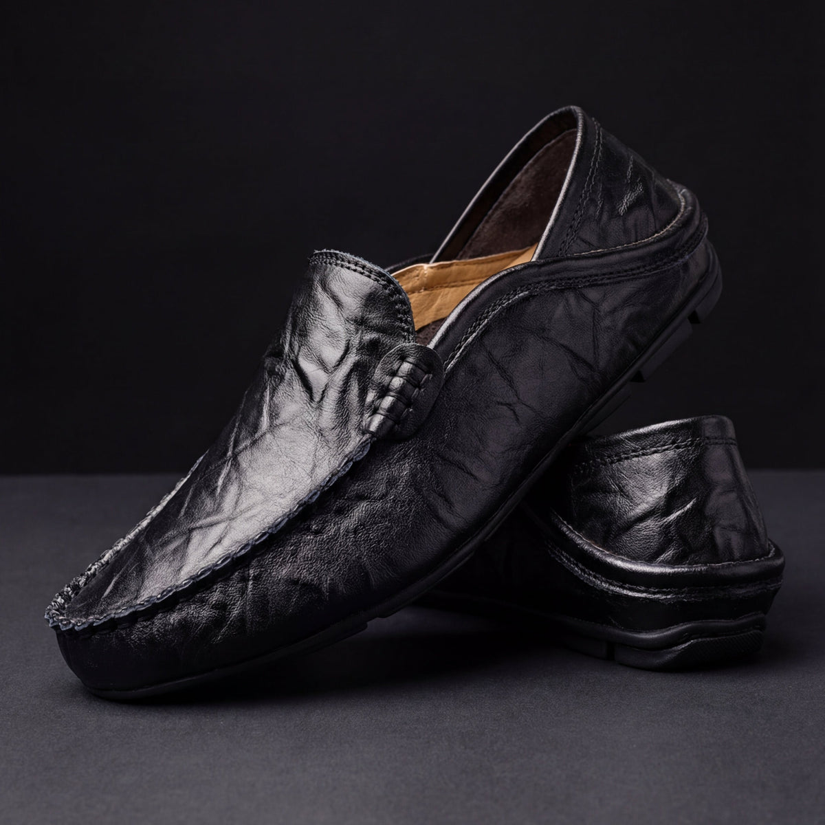 Men's Slip-On Loafers with Apron Stitching in Black – three-quarter pair | Hensley London