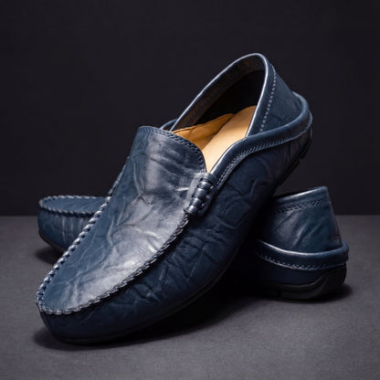 Men's Slip-On Loafers with Apron Stitching in Navy – three-quarter pair | Hensley London