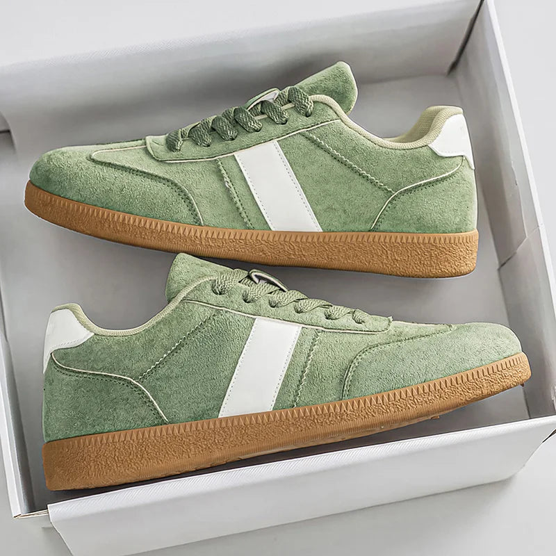 Men's Suede Low-Top Court Sneakers in Green – angled view | Hensley London