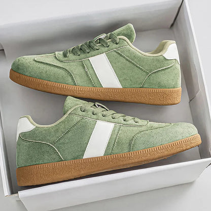 Men's Suede Low-Top Court Sneakers in Green – angled view | Hensley London