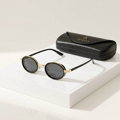 Women's Slim Oval Metal Sunglasses – angled view | Hensley London