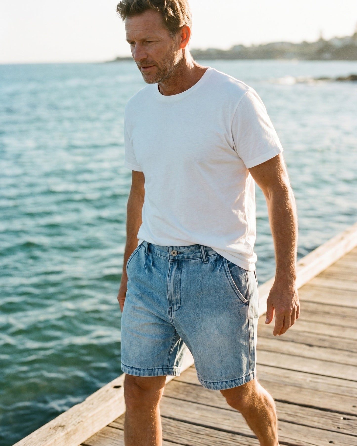 Men's Washed Cotton Denim Shorts in Light Blue – fabric close-up | Hensley London