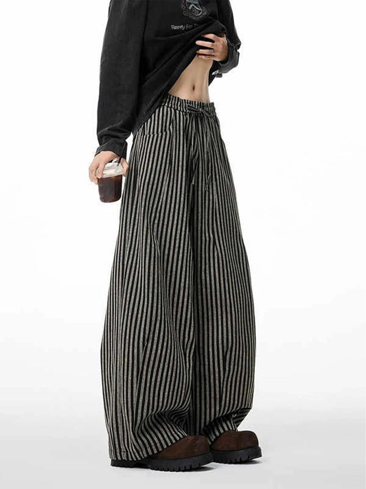 Women's Pinstripe Balloon Trousers with Drawstring Waist in Black – product view 1 | Hensley London