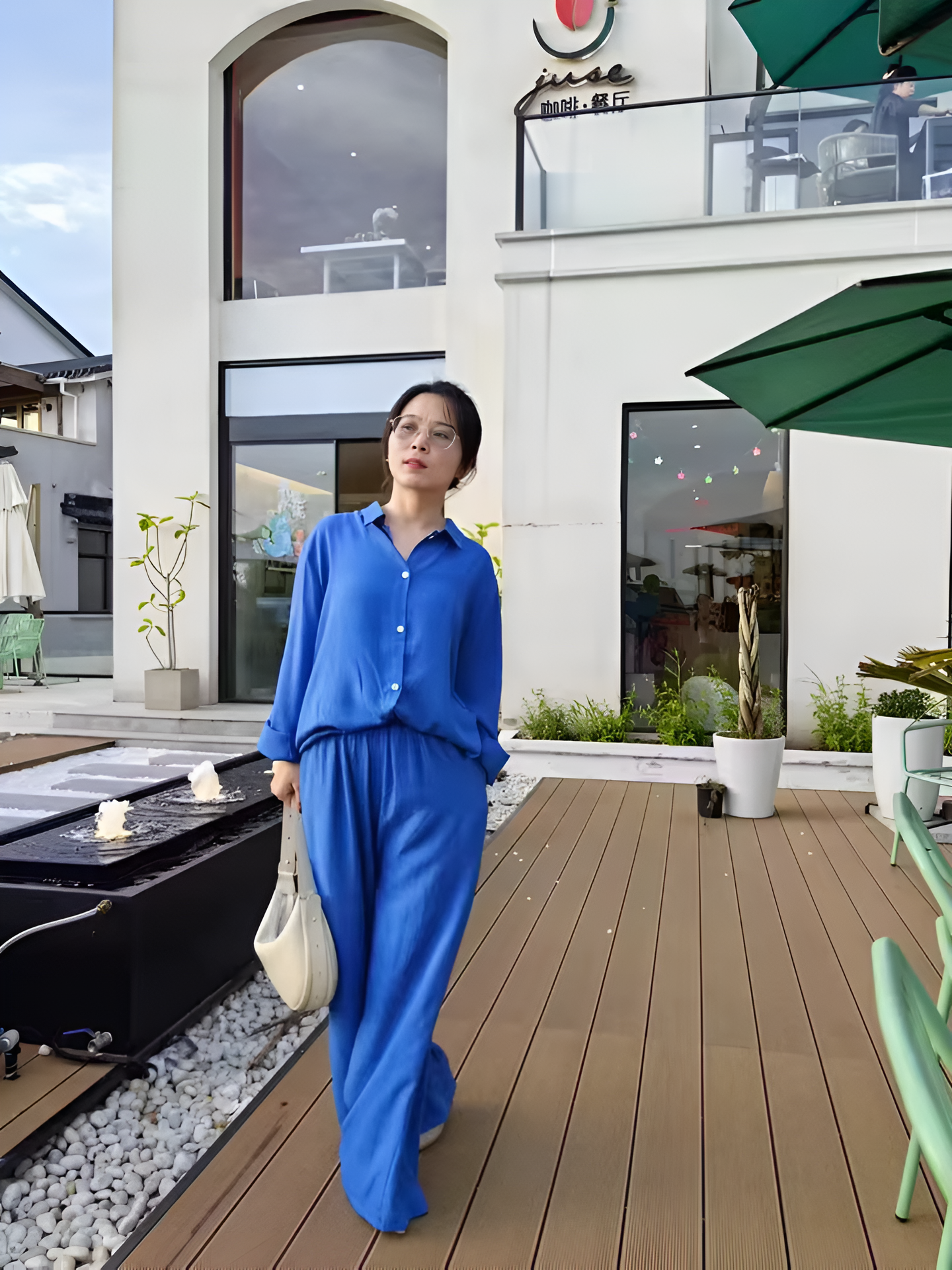 Women's Linen Blend Shirt & Wide-Leg Pants Set in Light Green – front view | Hensley London