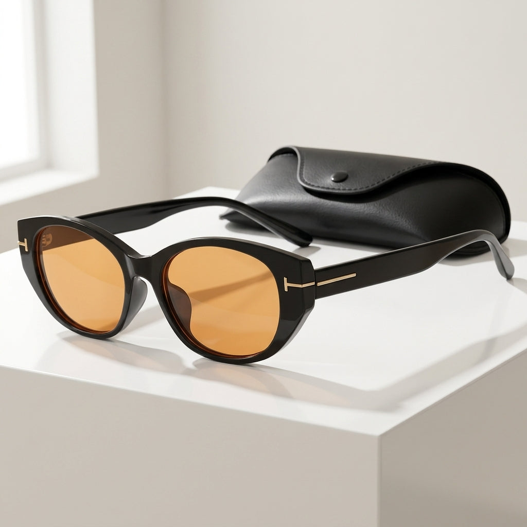 Women's Oval Frame Retro Sunglasses in Orange – angled view | Hensley London