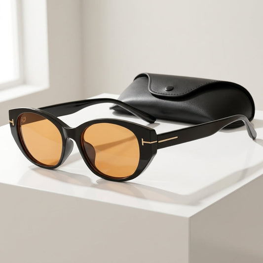 Women's Oval Frame Retro Sunglasses in Orange – angled view | Hensley London
