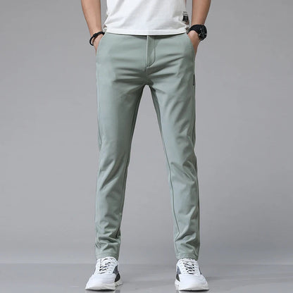 Men's Stretch Slim-Fit Trousers in Green - product view | Hensley London