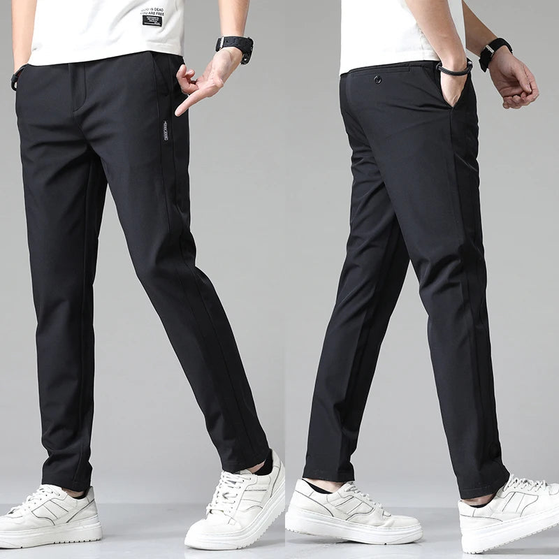 Men's Stretch Slim-Fit Trousers in Black - product view | Hensley London