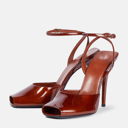Women's Glossy Faux Leather Peep-Toe Ankle Strap Heels - product view | Hensley London