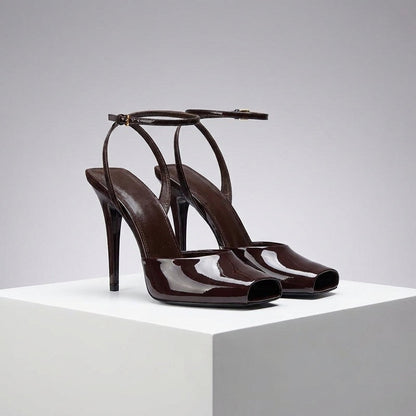 Women's Glossy Faux Leather Peep-Toe Ankle Strap Heels - product view | Hensley London