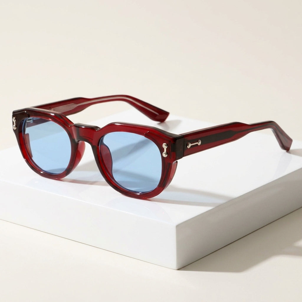 Women's Chunky Round Retro Sunglasses in Blue – angled view | Hensley London