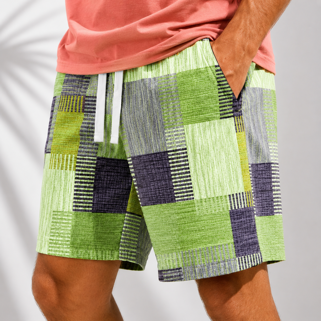 Men's Geometric Patchwork Print Shorts in Green – front view | Hensley London