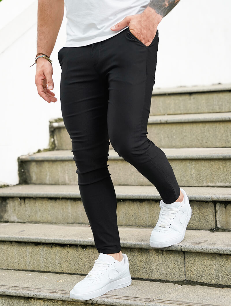 Men's Slim-Fit Stretch Trousers in Black – close-up view | Hensley London