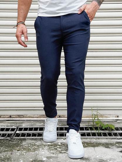 Men's 4-Way Stretch Slim Fit Pants in Blue – fabric detail | Hensley London