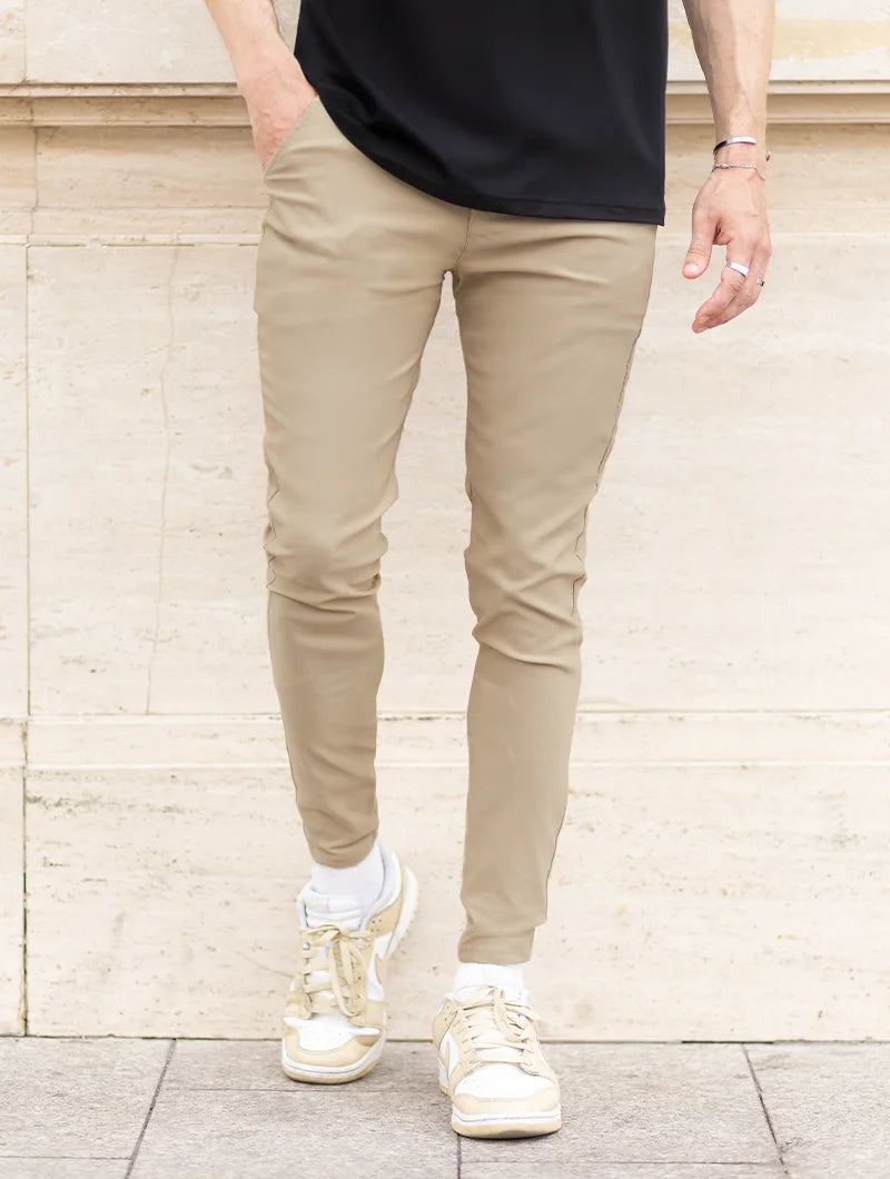 Men's Stretch Slim-Fit Pants in Khaki – back view | Hensley London