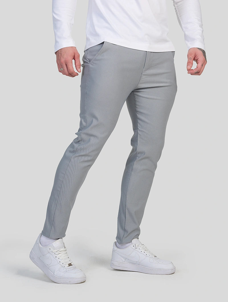 Men's 4-Way Stretch Slim Fit Pants in Light Grey – back view | Hensley London