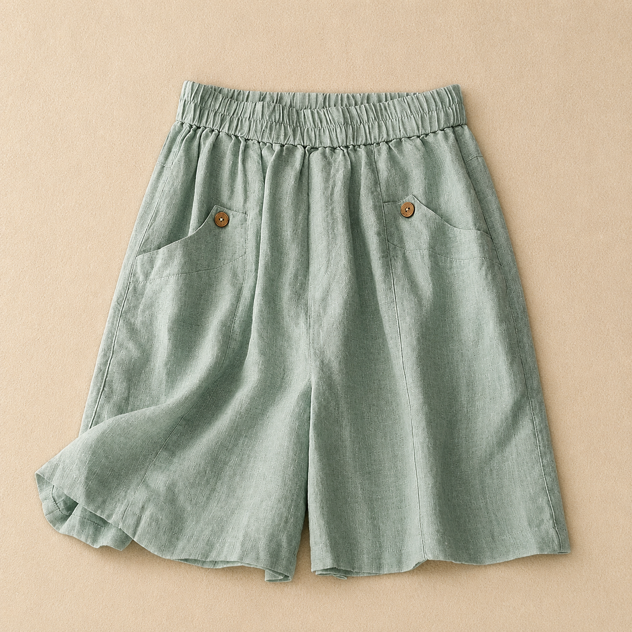 Women's Cotton Linen Elastic Waist Pocket Shorts in Green – front view | Hensley London