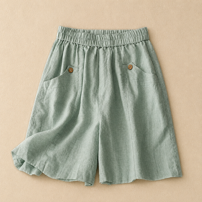 Women's Cotton Linen Elastic Waist Pocket Shorts in Green – front view | Hensley London