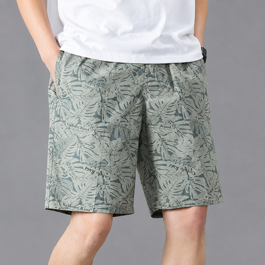 Men's Lightweight Tropical Print Shorts in Grey Green – front view | Hensley London