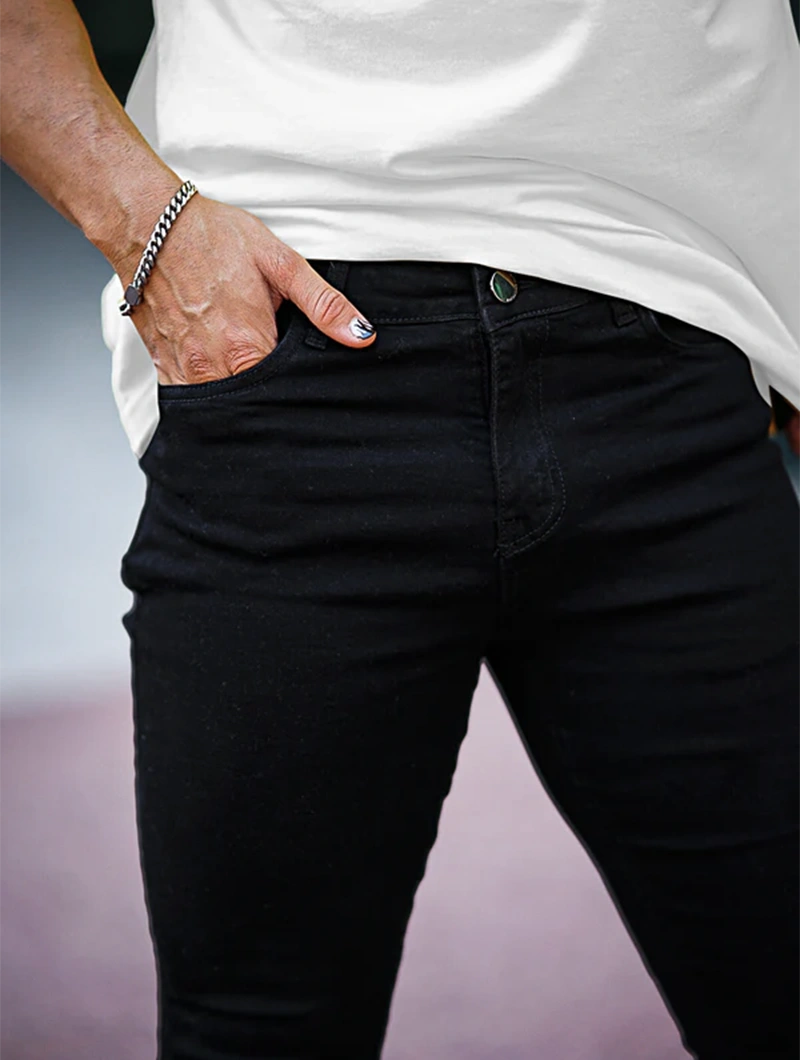 Men's Slim Fit Stretch Denim Jeans in Black – detail view | Hensley London
