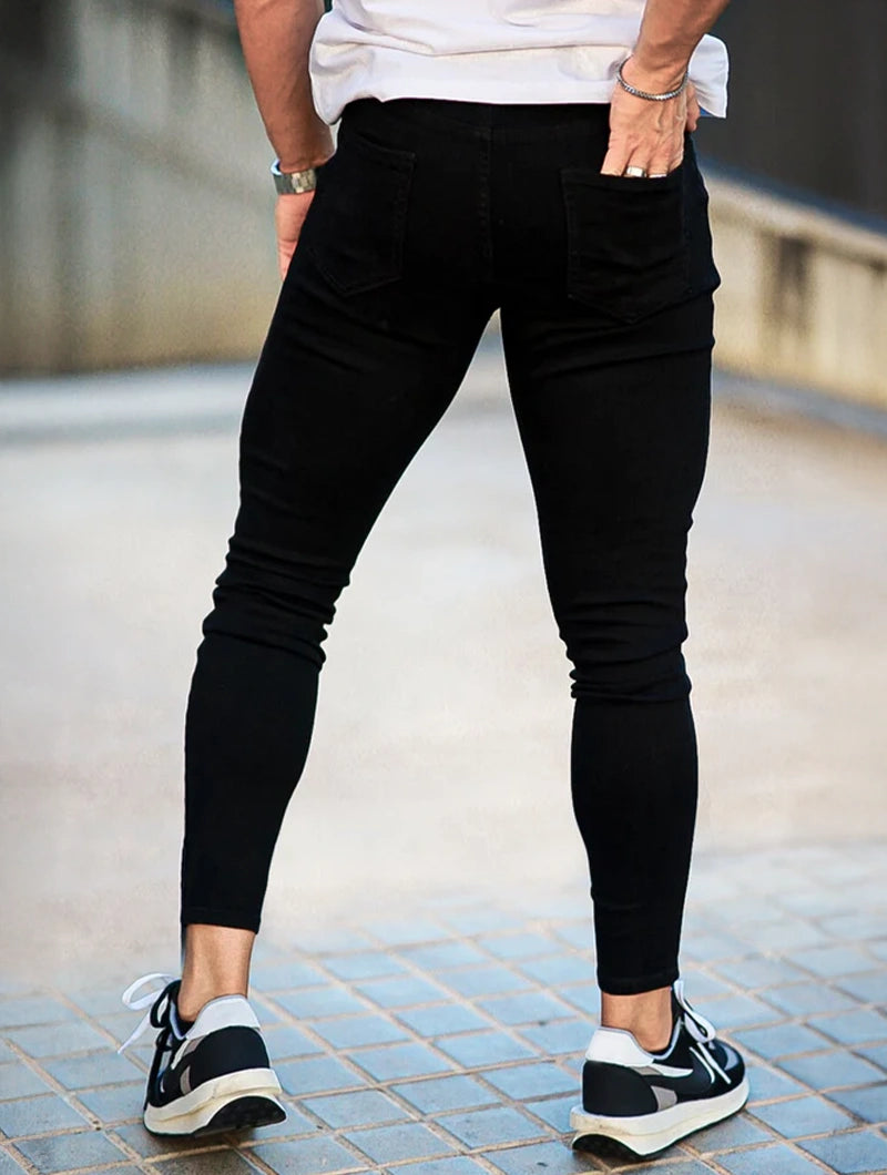 Men's Slim Fit Stretch Denim Jeans in Black – fabric detail | Hensley London