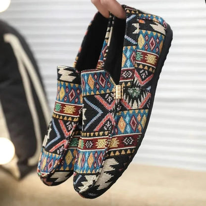 Men's Canvas Aztec-Print Slip-On Loafers in Black – front angle | Hensley London