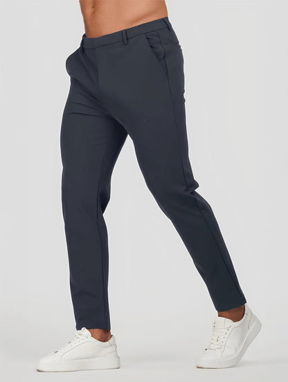 Men's Elastic Stretch Slim Fit Trousers in Navy Blue – front view | Hensley London